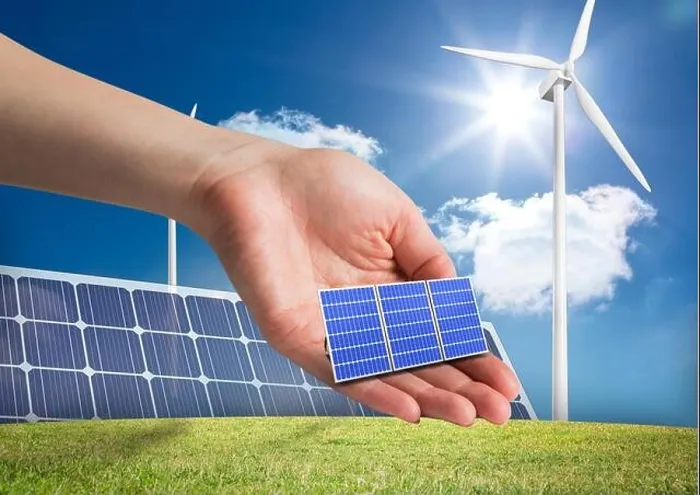 Framed Print : Digital composite of solar panel on hand in front of different devices to renewable energy Framed Print : Digital composite of solar panel on hand in front of different devices to renewable energy