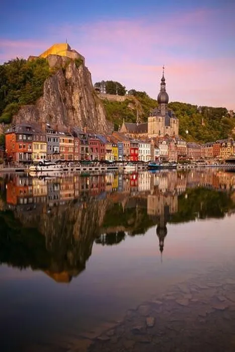 Framed Print : Dinant, Belgium. Cityscape image of beautiful historical city of Dinant with the reflection of the city in the Meuse River at summer sunset Framed Print : Dinant, Belgium. Cityscape image of beautiful historical city of Dinant with the reflection of the city in the Meuse River at summer sunset