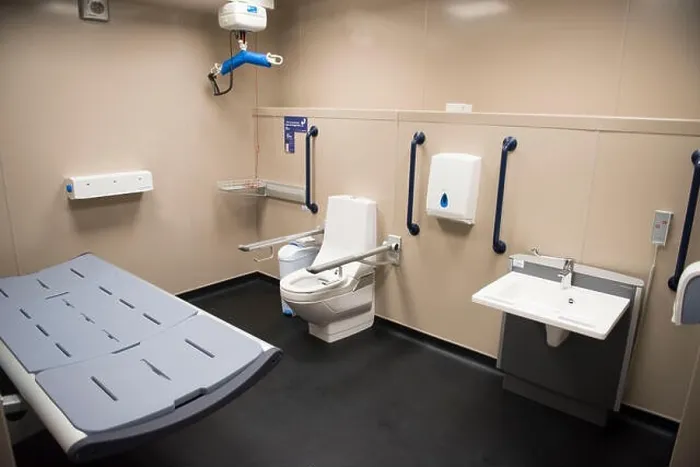 Framed Print : Disabled toilet and baby changing facilities in a public toilet Framed Print : Disabled toilet and baby changing facilities in a public toilet