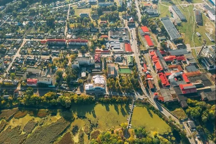 Framed Print : Dobrush, Gomel Region, Belarus. Aerial View Of Old And Modern Paper Factory. Historical Heritage In Bird's-eye View Framed Print : Dobrush, Gomel Region, Belarus. Aerial View Of Old And Modern Paper Factory. Historical Heritage In Bird's-eye View