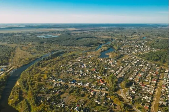 Framed Print : Dobrush, Gomel Region, Belarus. Aerial View Of Dobrush Cityscape Skyline In Summer Day. Residential District And River In Bird's-eye View Framed Print : Dobrush, Gomel Region, Belarus. Aerial View Of Dobrush Cityscape Skyline In Summer Day. Residential District And River In Bird's-eye View