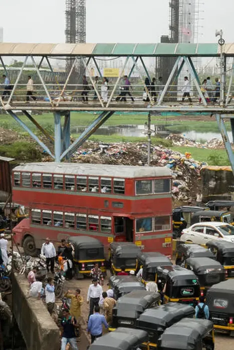 Framed Print : Double decker bus in traffic on Station road with Bandra pedestrian skywalk above, Mumbai, India Framed Print : Double decker bus in traffic on Station road with Bandra pedestrian skywalk above, Mumbai, India
