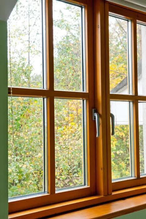 Framed Print : Double glazed wooden window frame in the home in the autumn season Framed Print : Double glazed wooden window frame in the home in the autumn season