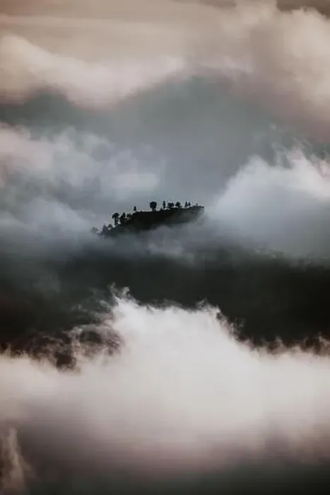 Framed Print : Dramatic scenery of dark mountain top seen through dense gray clouds and fog in highlands Framed Print : Dramatic scenery of dark mountain top seen through dense gray clouds and fog in highlands