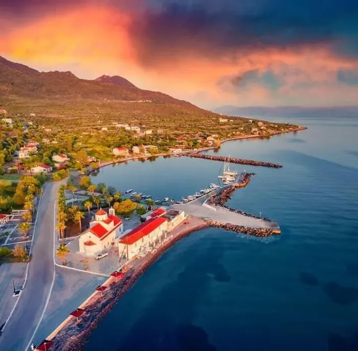 Framed Print : Dramatic summer sunrise in St. Georgios port