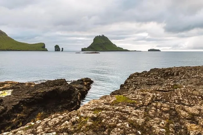 Framed Print : Dramatic view on Drangarnir and Tindholmur sea stacks in Atlantic ocean from Vagar island, Faroe Islands. Landscape photography Framed Print : Dramatic view on Drangarnir and Tindholmur sea stacks in Atlantic ocean from Vagar island, Faroe Islands. Landscape photography