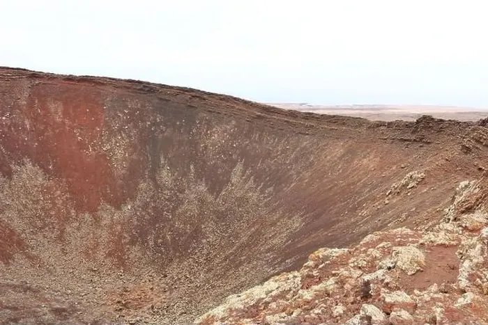 Framed Print : the Dramatic volcanic red deserted crater of Calderon Hondo volcano near to Corralejo, Fuerteventura. Canary Islands Framed Print : the Dramatic volcanic red deserted crater of Calderon Hondo volcano near to Corralejo, Fuerteventura. Canary Islands