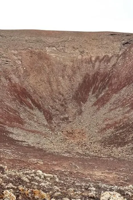 Framed Print : the Dramatic volcanic red deserted crater of Calderon Hondo volcano near to Corralejo, Fuerteventura. Canary Islands