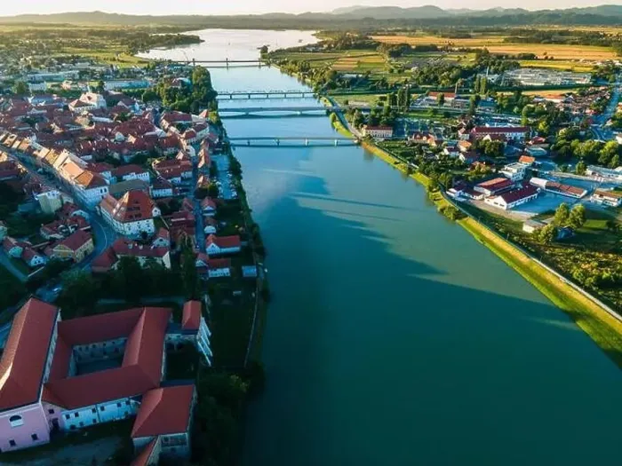 Framed Print : Drava River in Ptuj City, Slovenia. Aerial Drone View Framed Print : Drava River in Ptuj City, Slovenia. Aerial Drone View