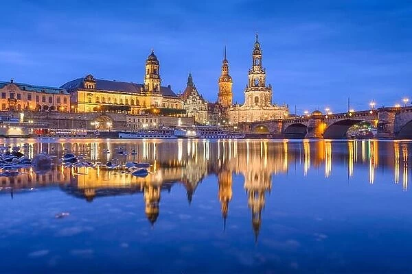 Dresden, Germany classical cathedrals and spires on The Elbe River at night