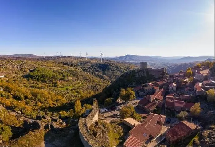 Framed Print : Drone aerial panorama of historic village of Sortelha with castle and with turbines on natural landscape, in Portugal Framed Print : Drone aerial panorama of historic village of Sortelha with castle and with turbines on natural landscape, in Portugal