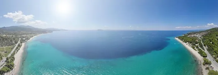 Framed Print : Drone aerial panorama of sea shore, sandy beach and blue water Framed Print : Drone aerial panorama of sea shore, sandy beach and blue water