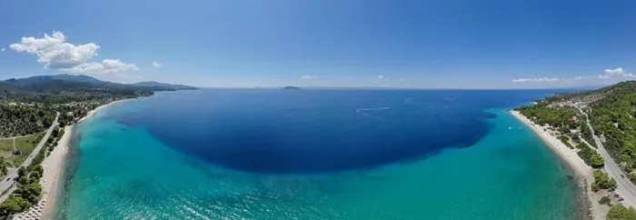 Framed Print : Drone aerial panorama of sea shore, sandy beach and blue water Framed Print : Drone aerial panorama of sea shore, sandy beach and blue water