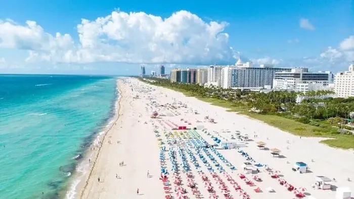 Framed Print : Drone aerial view at Miami South Beach Florida, Beach with colorful chairs and umbrellas Framed Print : Drone aerial view at Miami South Beach Florida, Beach with colorful chairs and umbrellas