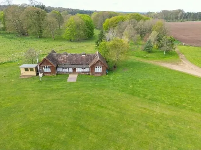 Framed Print : Drone aerial view of a mostly timber cricket pavilion seen at the edge of a lush cricket pitch Framed Print : Drone aerial view of a mostly timber cricket pavilion seen at the edge of a lush cricket pitch