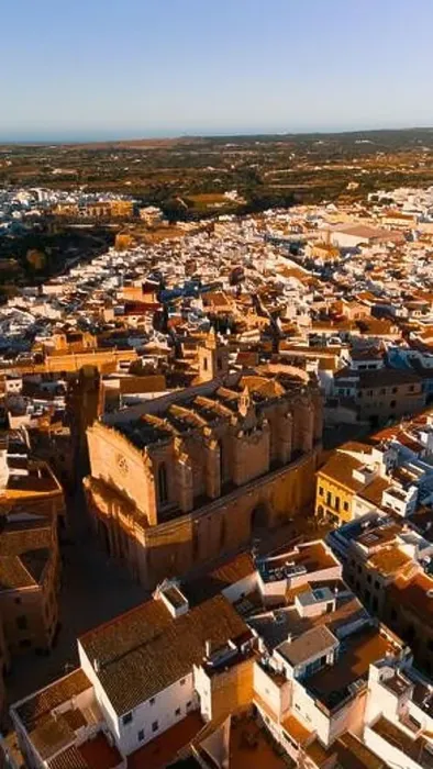 Framed Print : Drone capture of Ciutadella Cathedral dominating the town landscape at sunset Framed Print : Drone capture of Ciutadella Cathedral dominating the town landscape at sunset