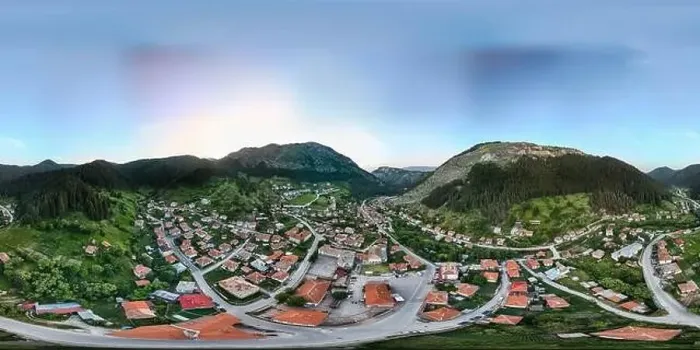 Framed Print : Drone capturing a panoramic view of a small village nestled in a valley Framed Print : Drone capturing a panoramic view of a small village nestled in a valley