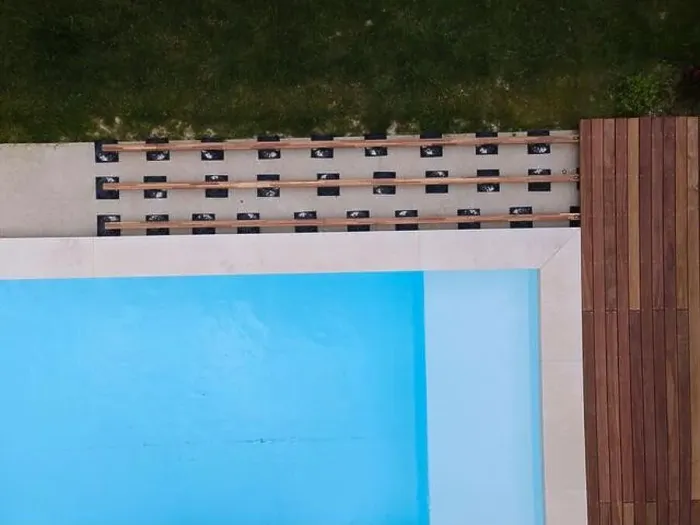 Framed Print : Drone flight over beautiful green garden with pool and the wooden terrace of the pool is currently in progress Framed Print : Drone flight over beautiful green garden with pool and the wooden terrace of the pool is currently in progress