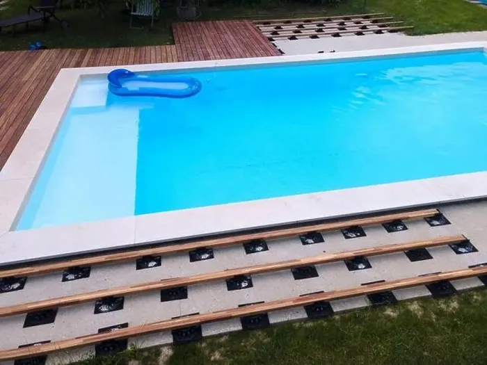 Framed Print : Drone flight over beautiful green garden with pool and the wooden terrace of the pool is currently in progress Framed Print : Drone flight over beautiful green garden with pool and the wooden terrace of the pool is currently in progress