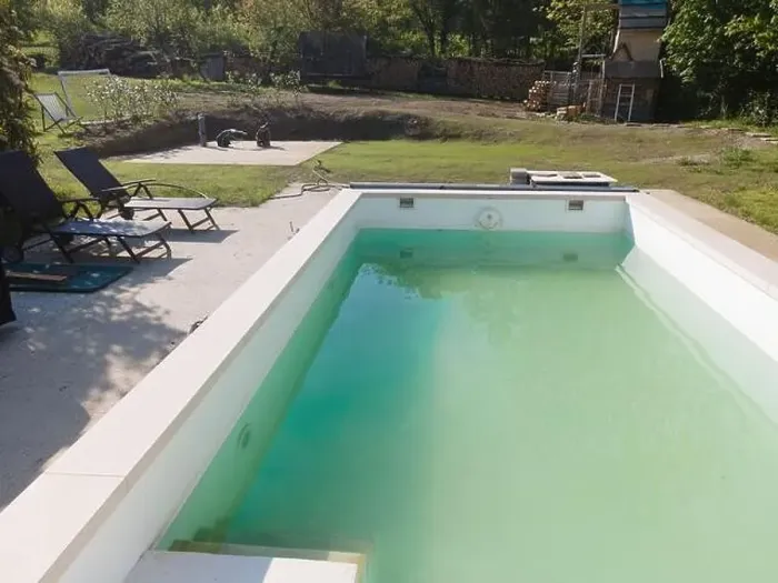 Framed Print : Drone flight over pool in the middle of greenery, fresh grass grown and the pool is not yet cleaned Framed Print : Drone flight over pool in the middle of greenery, fresh grass grown and the pool is not yet cleaned