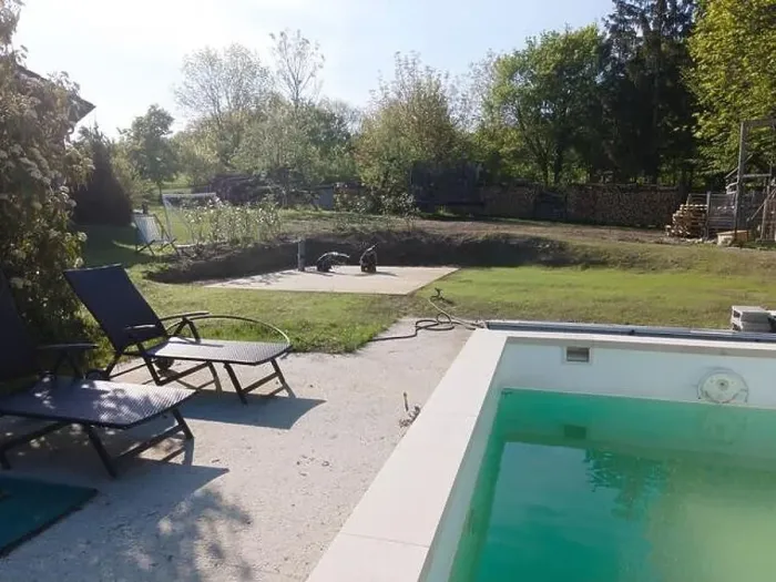 Framed Print : Drone flight over pool in the middle of greenery, fresh grass grown and the pool is not yet cleaned Framed Print : Drone flight over pool in the middle of greenery, fresh grass grown and the pool is not yet cleaned
