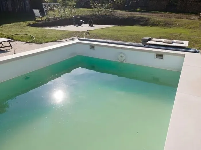 Framed Print : Drone flight over pool in the middle of greenery, fresh grass grown and the pool is not yet cleaned Framed Print : Drone flight over pool in the middle of greenery, fresh grass grown and the pool is not yet cleaned