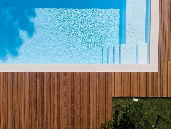 Framed Print : Drone flight over pool with nice wooden terrace surrounded by green lawn in beautiful garden Framed Print : Drone flight over pool with nice wooden terrace surrounded by green lawn in beautiful garden