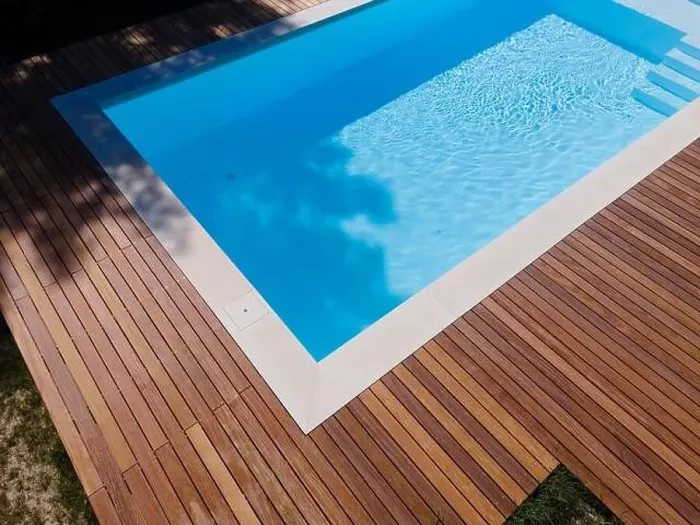 Framed Print : Drone flight over pool with nice wooden terrace surrounded by green lawn in beautiful garden Framed Print : Drone flight over pool with nice wooden terrace surrounded by green lawn in beautiful garden