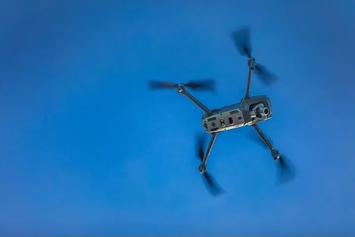 Framed Print : Drone flying drone on a blurry background of nature Framed Print : Drone flying drone on a blurry background of nature