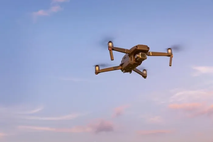 Framed Print : Drone flying over landscape. UAV drone copter flying with digital camera Framed Print : Drone flying over landscape. UAV drone copter flying with digital camera