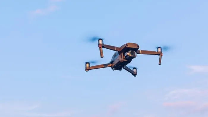 Framed Print : Drone flying over landscape. UAV drone copter flying with digital camera Framed Print : Drone flying over landscape. UAV drone copter flying with digital camera