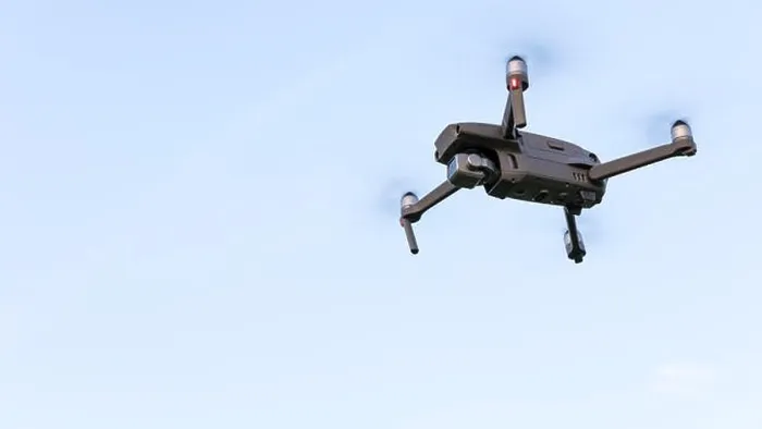 Framed Print : Drone flying over landscape. UAV drone copter flying with digital camera Framed Print : Drone flying over landscape. UAV drone copter flying with digital camera