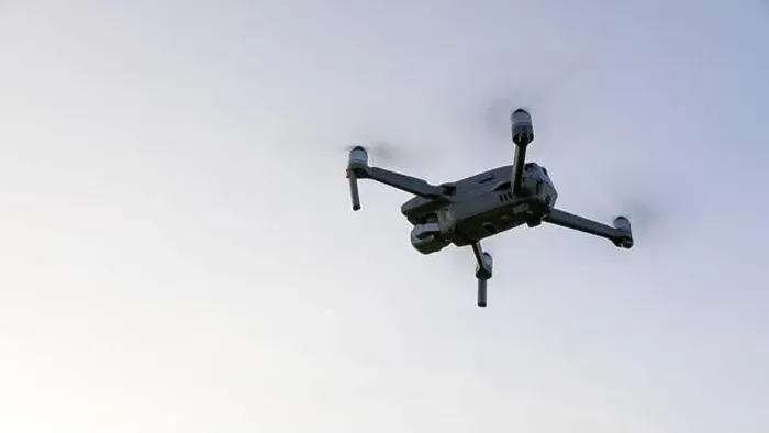 Framed Print : Drone flying over landscape. UAV drone copter flying with digital camera Framed Print : Drone flying over landscape. UAV drone copter flying with digital camera