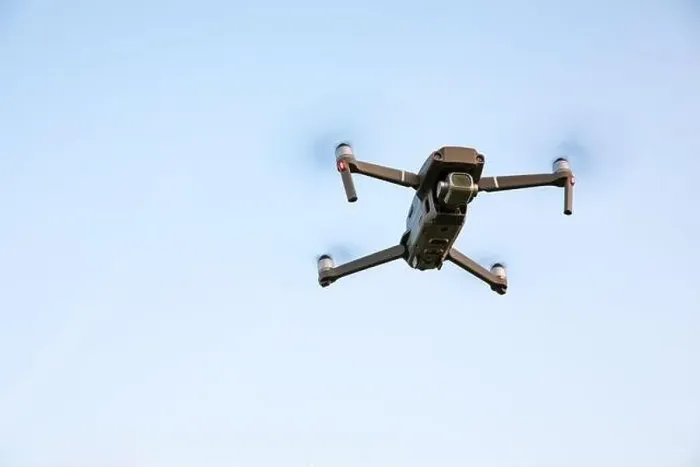 Framed Print : Drone flying over landscape. UAV drone copter flying with digital camera Framed Print : Drone flying over landscape. UAV drone copter flying with digital camera