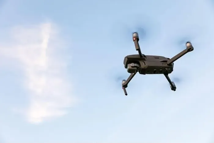 Framed Print : Drone flying over landscape. UAV drone copter flying with digital camera Framed Print : Drone flying over landscape. UAV drone copter flying with digital camera