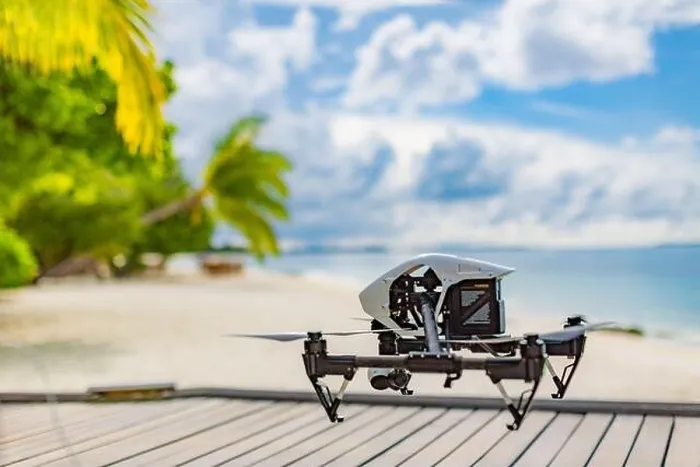 Framed Print : Drone flying over sea coast and palm trees. Tropical footage or photo creating. UAV professional drone in exotic island view Framed Print : Drone flying over sea coast and palm trees. Tropical footage or photo creating. UAV professional drone in exotic island view