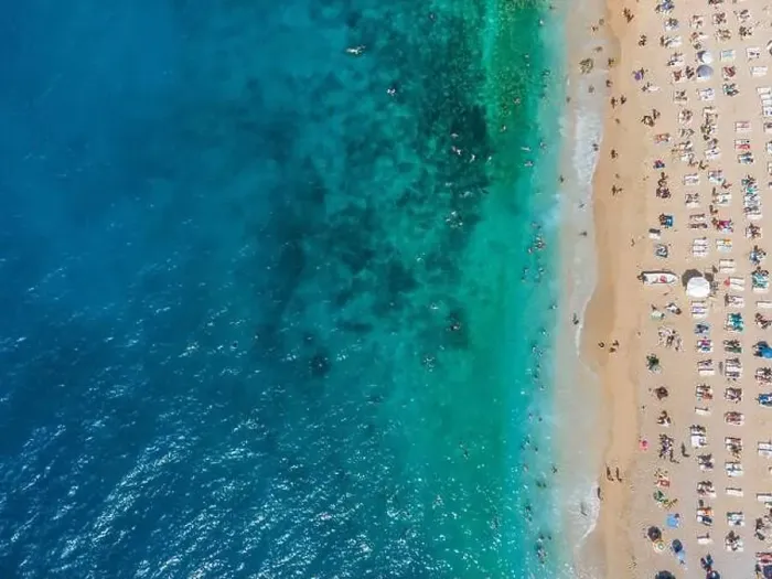Framed Print : Drone footage of people sunbathing on Kaputaş beach near Kalkan - Kaş, Antalya, Turkey