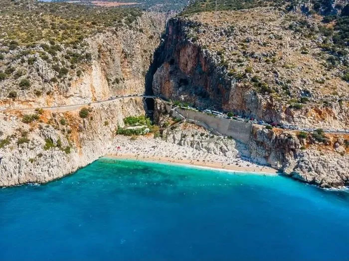Framed Print : Drone footage of people sunbathing on Kaputaş beach near Kalkan - Kaş, Antalya, Turkey Framed Print : Drone footage of people sunbathing on Kaputaş beach near Kalkan - Kaş, Antalya, Turkey