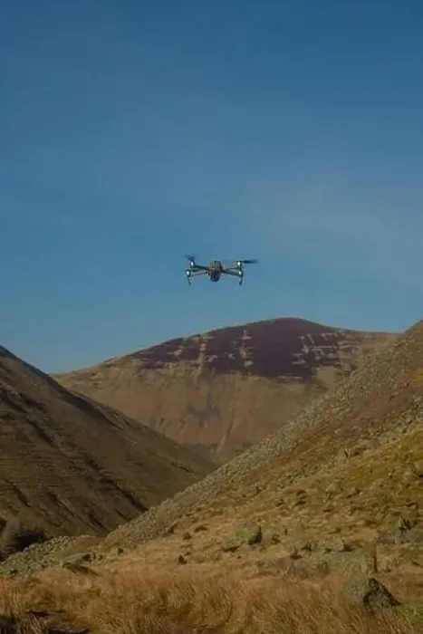 Framed Print : A Drone Hovers Above Hills and Valley in the Scottish Borders on a Sunny Day Framed Print : A Drone Hovers Above Hills and Valley in the Scottish Borders on a Sunny Day