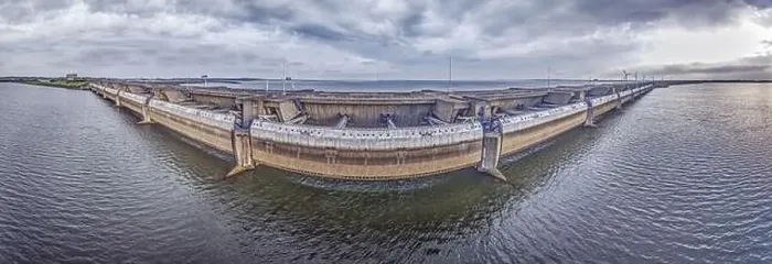 Framed Print : Drone image over the Haringvlietdam flood barrier near the Dutch town of Ouddorp against a cloudy morning sky Framed Print : Drone image over the Haringvlietdam flood barrier near the Dutch town of Ouddorp against a cloudy morning sky