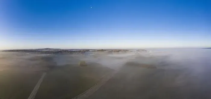 Framed Print : Drone image of morning ground fog over fields in the German province of North Hesse near the village of Rhoden in autumn