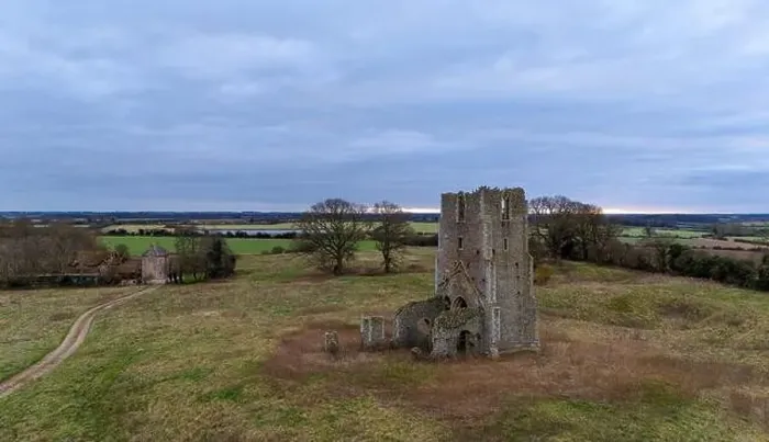 Framed Print : A drone image taking looking over the Tower and ruins of St Edmund at Egmere, North Norfolk, UK Framed Print : A drone image taking looking over the Tower and ruins of St Edmund at Egmere, North Norfolk, UK