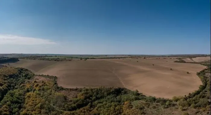 Framed Print : drone landscape view of endless brown plowed agricultural fields on the Danubian Plain of Bulgaria Framed Print : drone landscape view of endless brown plowed agricultural fields on the Danubian Plain of Bulgaria