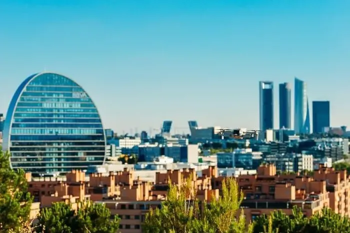 Framed Print : Drone with Madrid Cuatro Torres skyline in the background Framed Print : Drone with Madrid Cuatro Torres skyline in the background