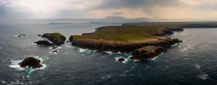 Framed Print : A drone panorama of the cliffs of Erris Head on the northern tip of the Mullet Peninsula in County Mayo under a stormy Framed Print : A drone panorama of the cliffs of Erris Head on the northern tip of the Mullet Peninsula in County Mayo under a stormy