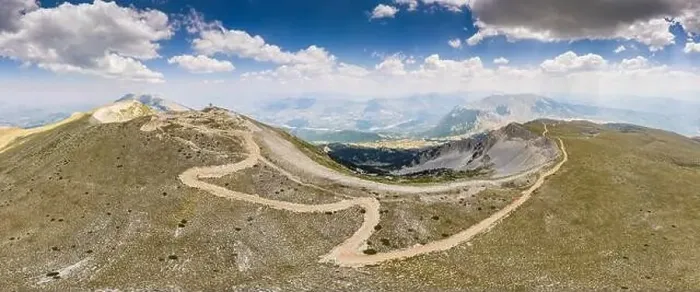 Framed Print : Drone panorama of Mount Tomorr in the Tomorr National Park with Shrine (tyrbe) of Abbas ibn Ali on the top in Summer Framed Print : Drone panorama of Mount Tomorr in the Tomorr National Park with Shrine (tyrbe) of Abbas ibn Ali on the top in Summer