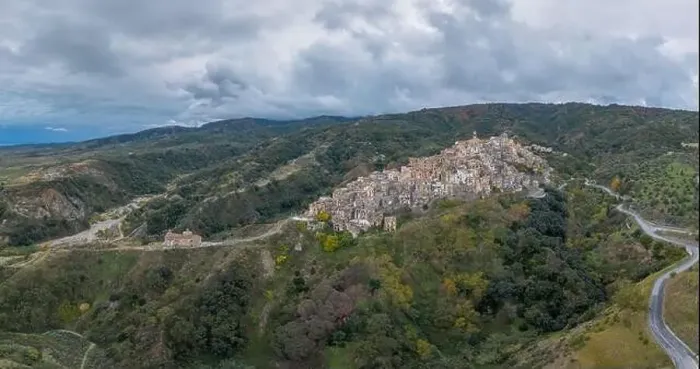 Framed Print : Drone perspective of the picturesque mountain village and church of Badolato in Calabria Framed Print : Drone perspective of the picturesque mountain village and church of Badolato in Calabria