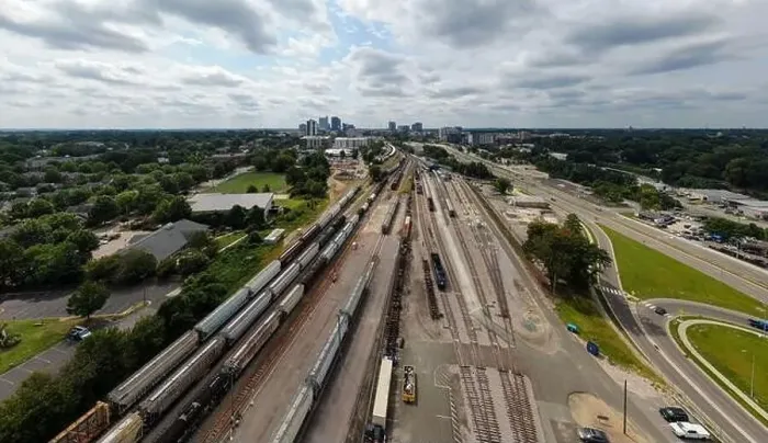 Framed Print : drone photos of various rail cars and amtrak trains on a cloudy day in downtown raleigh north carolina Framed Print : drone photos of various rail cars and amtrak trains on a cloudy day in downtown raleigh north carolina