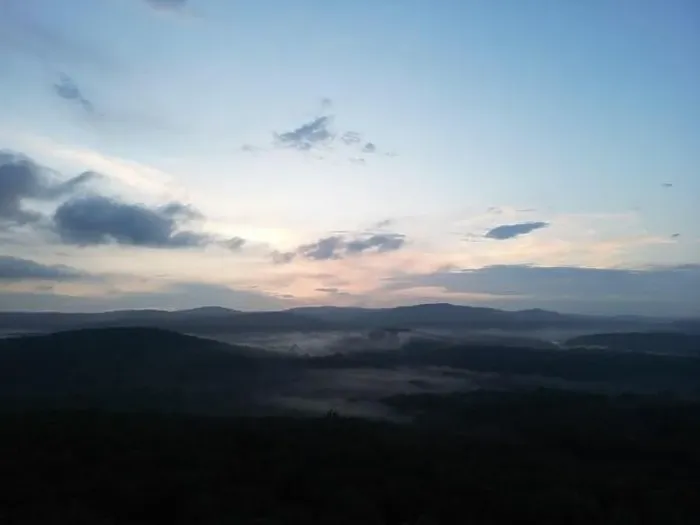 Framed Print : Drone picture of a foggy valley with rolling hills during sunset Framed Print : Drone picture of a foggy valley with rolling hills during sunset