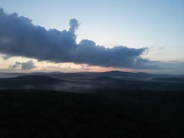 Framed Print : Drone picture of a foggy valley with rolling hills during sunset Framed Print : Drone picture of a foggy valley with rolling hills during sunset